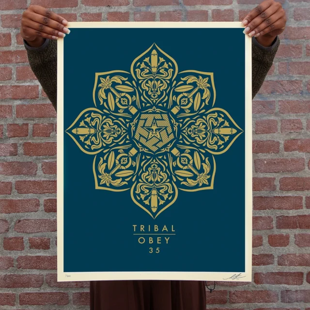 NEW Print Release: “Tribal Anniversary” In Collaboration With @tribalstreetwear. Available Thursday, September 19th @ 10 AM PT!

I designed this mandala, which symbolizes harmony and unity, to include things that people might not necessarily see as going together but have been a big part of both the Tribal and Obey cultures for the 35 years we’ve been doing our thing, it is phenomenal to see how connected Bobby has been with people doing great creative work over all these years. Congrats on 35 years of Tribal! Thanks for your support from the beginning.
-S

There are only a handful of survivors from the early days of streetwear. Shepard and I thought it would be cool to celebrate this, 35 years later. Shepard and I first met at a 432F show here in San Diego. The 432F shows are where I claim streetwear was born. It was the first spot where brands from both the East Coast and West Coast showed collectively under one roof. What inspired Shepard and me to work together was our connection to the streets. We were always working with different types of graffiti writers, street artists, graphic designers, etc. Personally, I’m a collector of Shepard’s work—old work, new work, and everything in between. Collaborating with him means a lot. I’ve always had a ton of respect for Shepard. I’ve seen what he’s been able to accomplish worldwide with his OBEY Propaganda campaign. Beyond that, just how much he’s done is insane. Unlike any other street artist: Shepard Fairey, OBEY, and TRIBAL, 35 years strong.
- @bobbytribal 

PRINT DETAILS:
Tribal Anniversary. 18 x 24 inches. Screen print on thick cream Speckletone paper. Signed by Shepard Fairey. Numbered edition of 300. Comes with a Digital Certificate of Authenticity provided by Verisart. $65. Available on Thursday, September 19th @ 10 AM PDT at https://store.obeygiant.com. Max order: 1 per customer/household. International customers are responsible for import fees due upon delivery (Except UK orders under $160).⁣ ALL SALES FINAL.

#obey #obeygiant #shepardfairey #tribal #streetart #streetwear #bobbytribal #sandiego