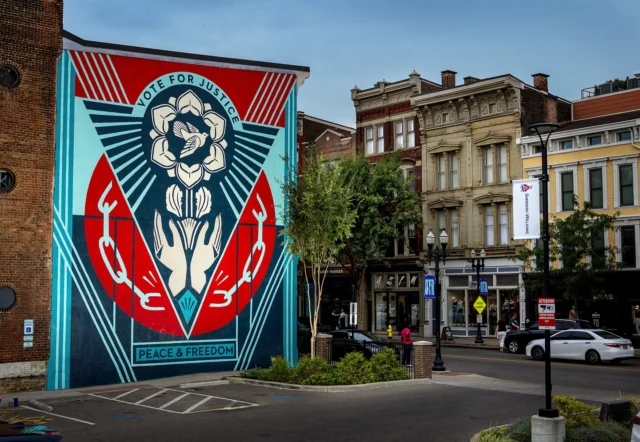 The crew and I just finished a three-story mural in the Over the Rhine district of Cincinnati. This “Vote for Justice” mural is a reminder that participating in democracy by voting is a crucial way to shape our society and push for our ideals. Peace and freedom are important principles for me, and the freedom of every eligible voter to do so peacefully without intimidation is essential for a healthy democracy. While in Ohio, my team and I also pasted up about 35 large get-out-the-vote images in Cincinnati, Dayton, Columbus, and Springfield. We met amazing people in each city, and the Ohio hospitality was deeply appreciated. We were very fortunate to have the support of #ArtsVoteOhio (@creativeohio_), ArtWorks Cincinnati (@artworkscincy), The Greater Columbus Arts Council (@artmakescbus), and Democracy and the Arts, and the Charles F. Kettering Foundation, Dayton (@ketteringfoundation). Thank you to my crew, Dan Flores, Rob Zagula, and Jon Furlong, for their hard work—photo by @jonathanfurlong.
-Shepard