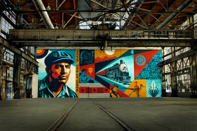 My team and I just finished this “People Power Mosaic” mural at the Barelas Rail Yards in Albuquerque, New Mexico. The location has historical significance as one of the economic drivers that helped to build Albuquerque. I was educated by the city’s arts and culture team, as well as by stakeholders from several local communities, about the rail yards, the culture of Albuquerque, and symbols of New Mexico. A consistent point made was that the blue-collar workers at the rail yards, many of whom were Native and Latino, did back-breaking work that has not always been recognized for its contribution to building Albuquerque. The worker on the left of the mural is meant to convey the hard physical effort and dignity of those laborers. I did a good bit of research and found out that Albuquerque native Soledad Chavez de Chacón was the first Latina Secretary of State of New Mexico elected in 1922, 3 years after women won the right to vote. She was also the acting governor of the state for 2 weeks in 1924. I was excited to highlight an important figure in New Mexico’s progressive history. I also included symbols in the mural, many of which originate from Native American culture but are synonymous with New Mexico, such as the Roadrunner, turquoise jewelry, the Three Sisters mountains, and fabric patterning. All of these motifs connect to things that are meaningful to me spiritually, like respecting nature and the delicate balance of ecosystems on which all life depends. The Yucca bloom symbolizes beauty, sturdiness, and resilience in challenging environmental conditions. Based on many conversations with locals, the spirit represented by the Yucca bloom is represented everywhere. I’m incredibly grateful for the education and trust given to me to take on this mural and the kind welcome I’ve been given. Thanks to @mayorkeller, @cabqculture, 
@abqpublicart, @railyardsmarket.abq, 
@VisitABQand for their support and guidance. I also need to thank my team - Dan Flores, Rob Zagula, and Jon Furlong for their hard work alongside me for several long, hot days to complete this project. - Shepard