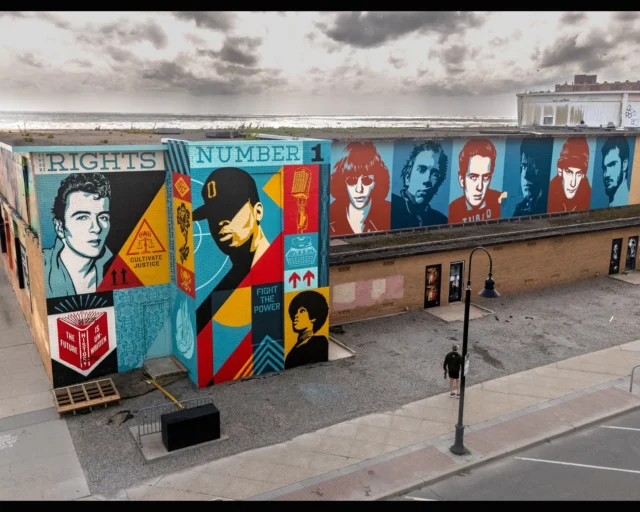 The crew and I were recently in Asbury Park, NJ, for my “Raw Power” art show and to paint a mural consisting of four walls. I had done a show and painted and pasted murals in Asbury back in 2011, and I’d hoped to return for many years. Asbury has a punk D.I.Y. spirit that is very special. In 2011, I collaborated with Jenn and Porkchop of Asbury Lanes and the Parlor Gallery, as well as gallerist Jonathan LeVine. We got the gang back together for the current show and murals, and I was delighted that Asbury’s very special spirit is alive and well, even as the pressures of gentrification encroach. One of the paste-up murals I did in 2011 was part of my Punk Rock Icons series, featuring Joey Ramone, John Lydon, Joe Strummer, Glenn Danzig, Ian MacKaye, and Henry Rollins. I brought the series back to the Sunset Pavilion, repainted my weathered megaphone mural, and painted new murals of Chuck D of Public Enemy and Joe Strummer of the Clash. The location was right in the thick of things for the @seahearnow Now music festival where I saw amazing performances by Die Spitz, The Pixies, Moby, Fontaines DC, and the Strokes. I also got to do a talk with photographer Danny Clinch, a major talent, cultural force, and festival partner. There was also a parade of giant puppets featuring incredible works by Dennis McNett, Adam Wallacavage, and Swoon. The community turned out in droves despite a drizzle. In terms of my taste and values, the week in Asbury was pretty utopian. Thanks to everyone who supported our projects, including @woodenwallsproject, @parlorgallery, @artspotap, @plusone.ap, @jonathanlevineprojects, @seahearnow, and Tim Donnelly. Thanks also to my crew, Dan Flores, Rob Zagula, and @jonathanfurlong, who also shot all the photos!
-Shepard